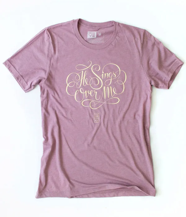 He Sings Over Me Tee – Heather Orchid