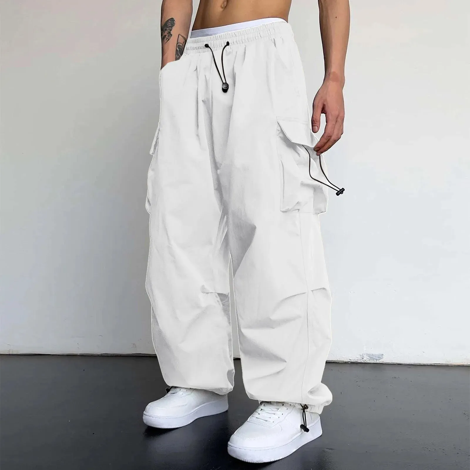 StreetFusion Herren Überdimensionierte Cargo Fallschirmhosen mit Jaggy-Design